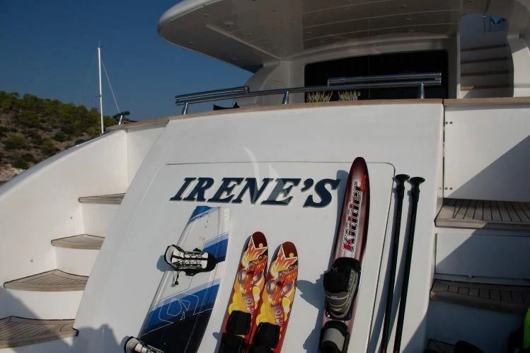 a white tent with a red and blue painting on it aboard IRENE'S Yacht for Sale