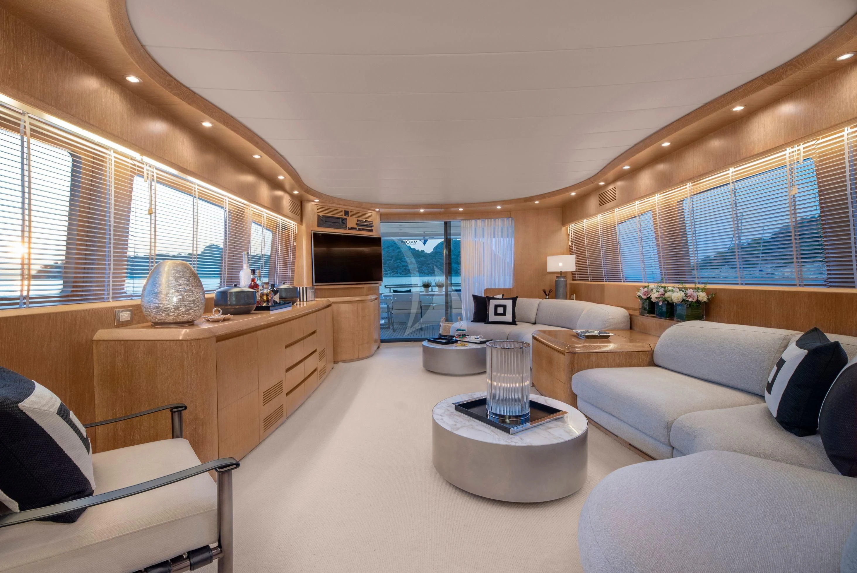 a living room with a large window aboard IRENE'S Yacht for Sale