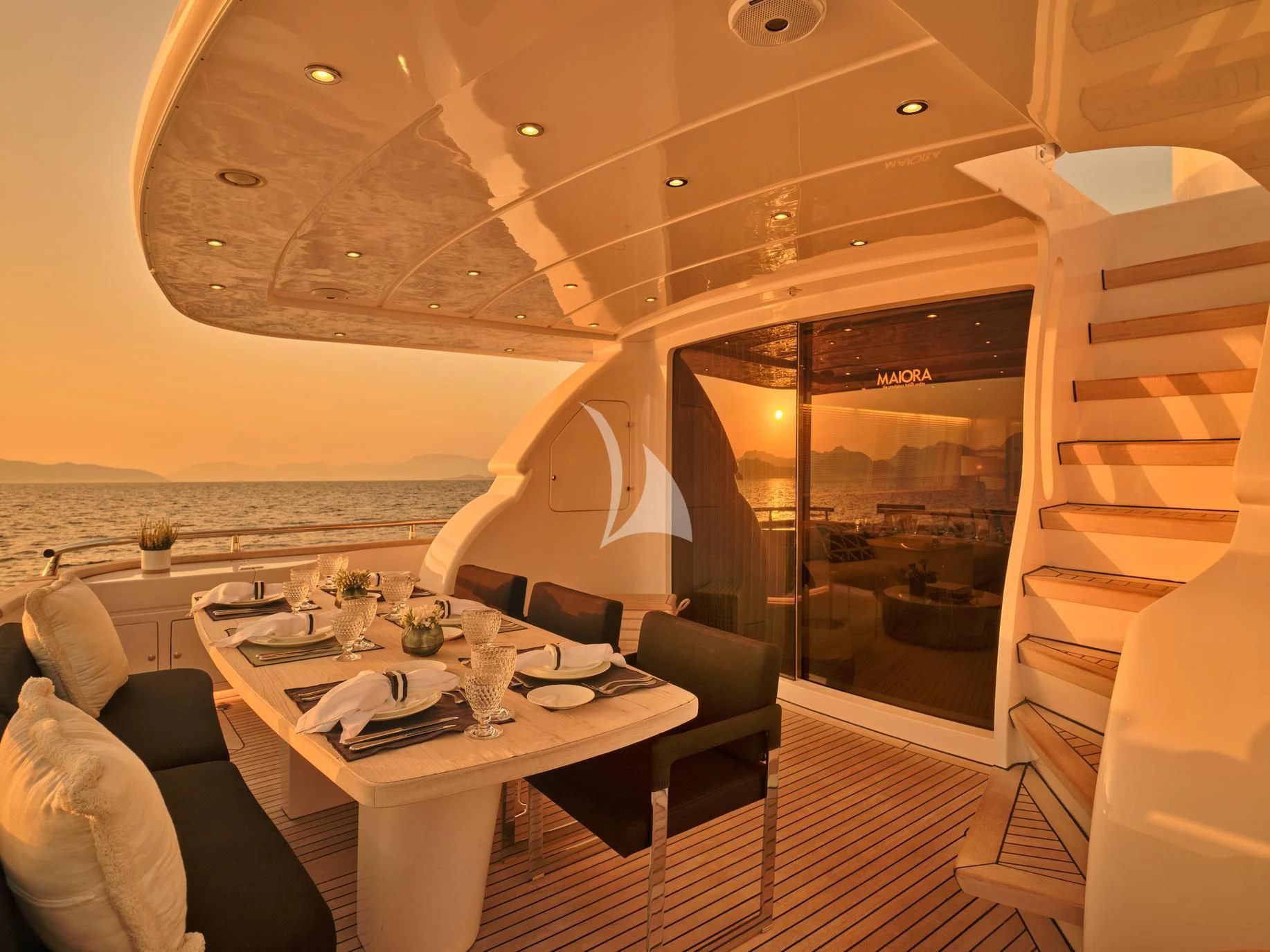 a dining table in a room aboard IRENE'S Yacht for Sale
