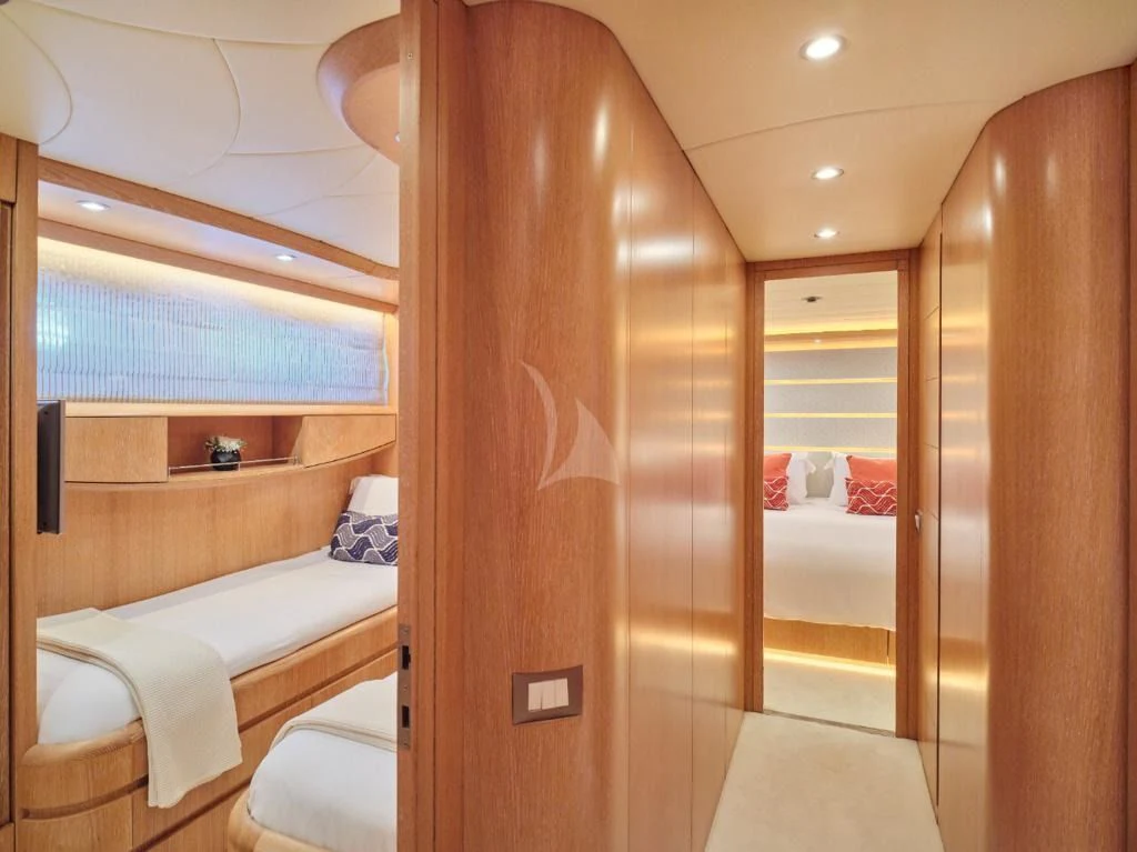 a room with a wood door and a wood cabinet aboard IRENE'S Yacht for Sale