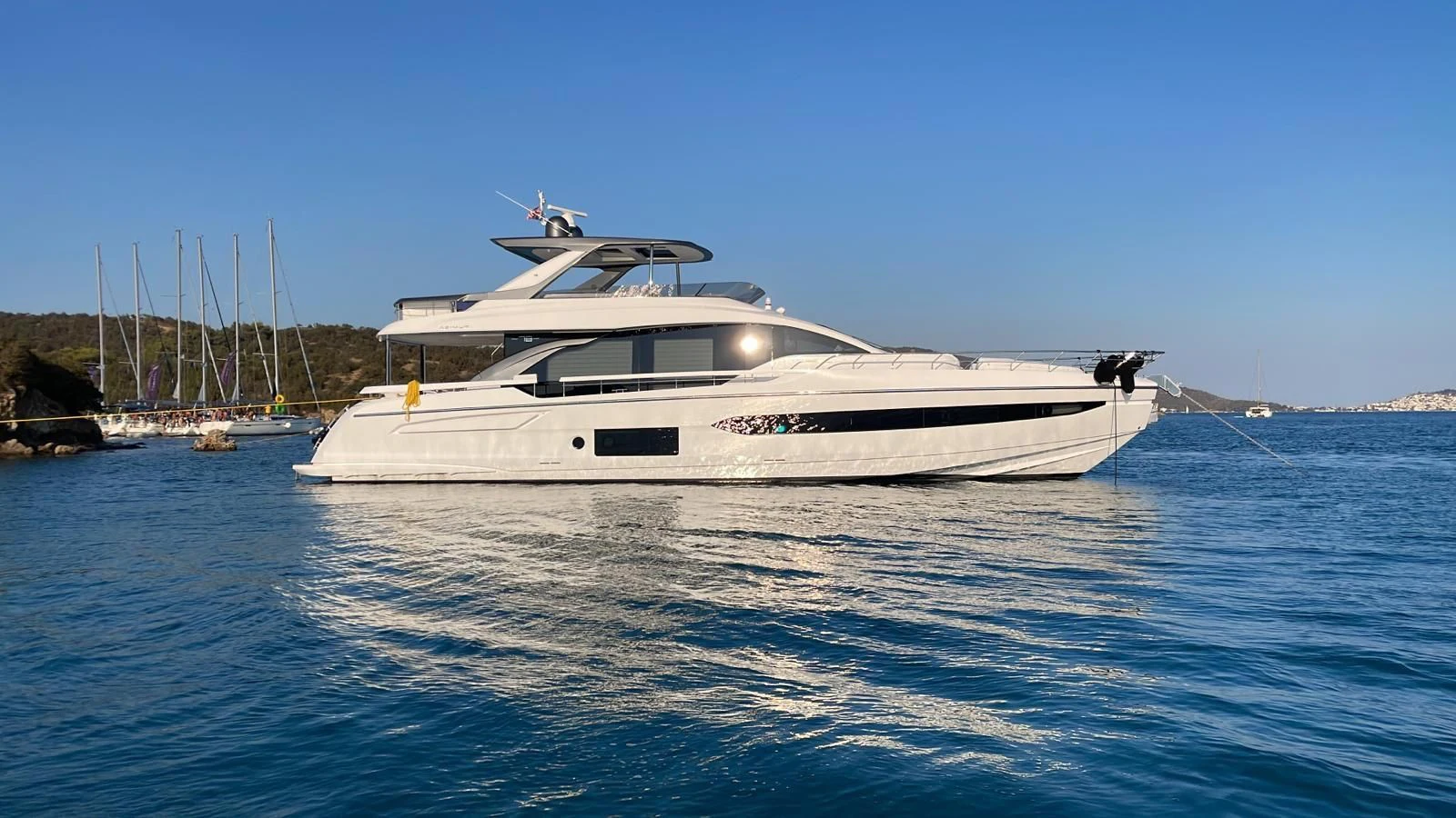 a white boat in the water aboard SUN LIFE Yacht for Sale