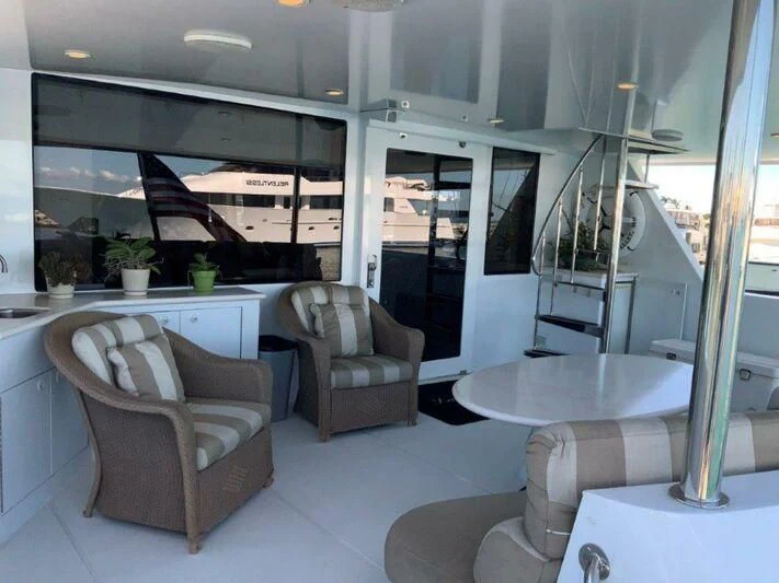 a room with a glass wall aboard LADY GRACE Yacht for Sale