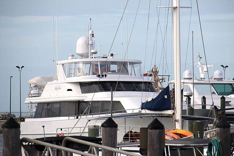 a boat docked at a pier aboard LADY GRACE Yacht for Sale