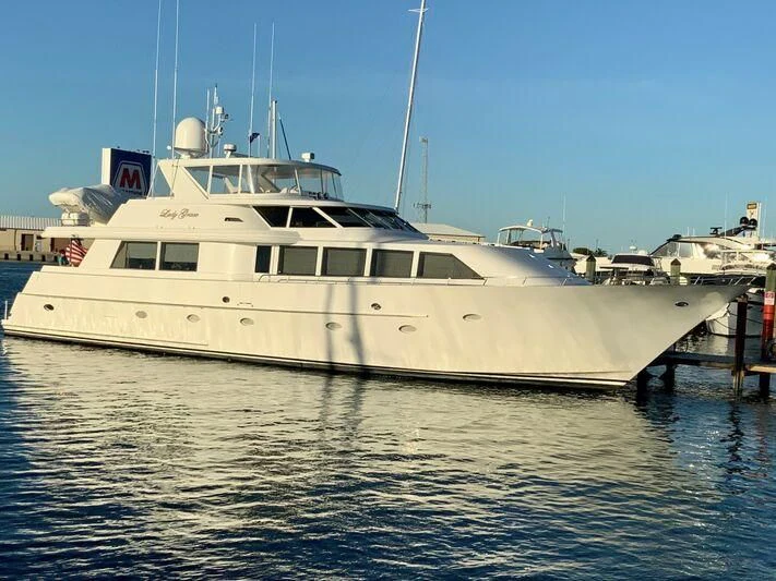 a large white boat in the water aboard LADY GRACE Yacht for Sale