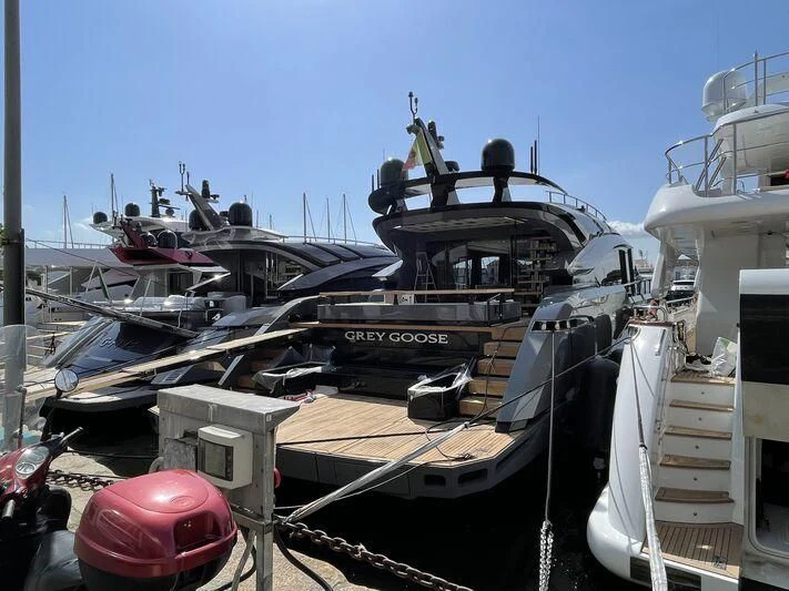 a boat docked at a pier aboard GREY GOOSE I Yacht for Sale