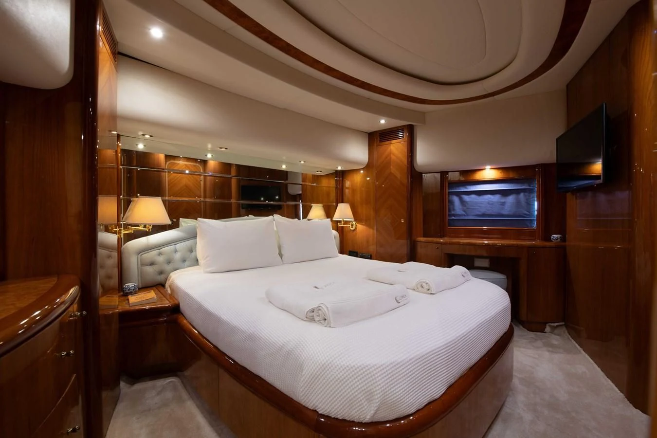 a bed in a room aboard STOLI Yacht for Sale