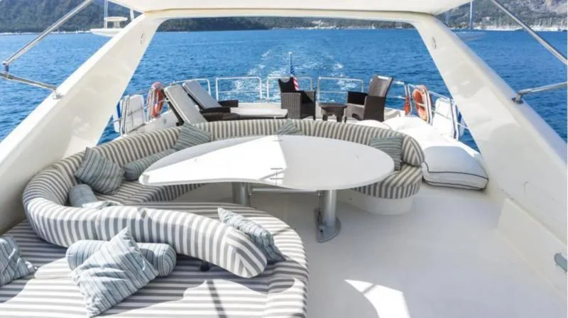 a boat on the water aboard STOLI Yacht for Sale