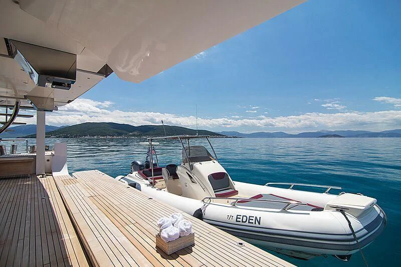 a boat docked at a pier aboard MY EDEN Yacht for Sale