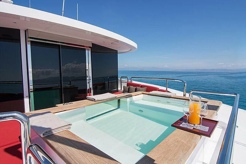 a glass of beer on a boat aboard MY EDEN Yacht for Sale