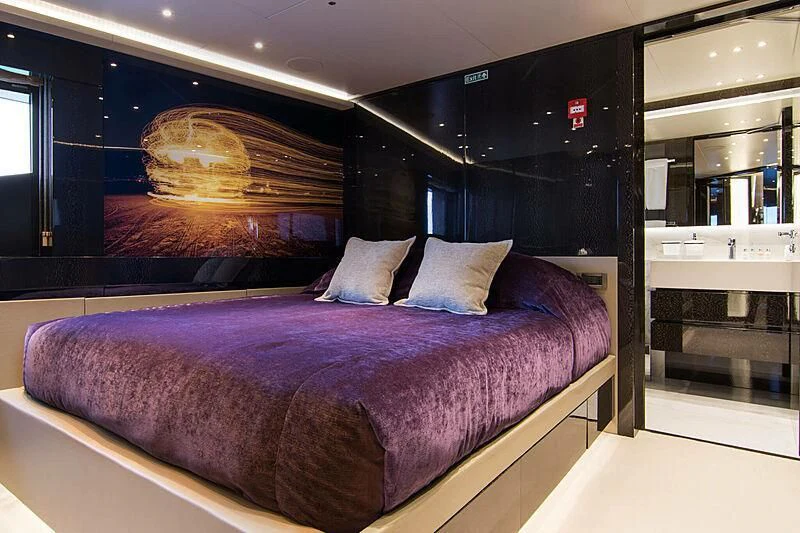 a bed in a room aboard MY EDEN Yacht for Sale