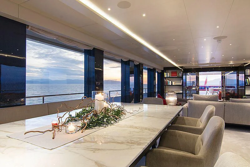 a living room with a large window aboard MY EDEN Yacht for Sale
