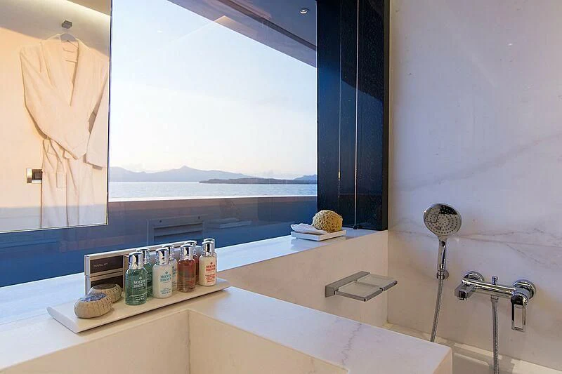 a bathroom with a window aboard MY EDEN Yacht for Sale