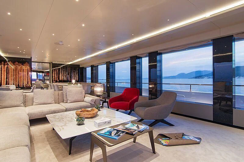 a living room with a large window aboard MY EDEN Yacht for Sale