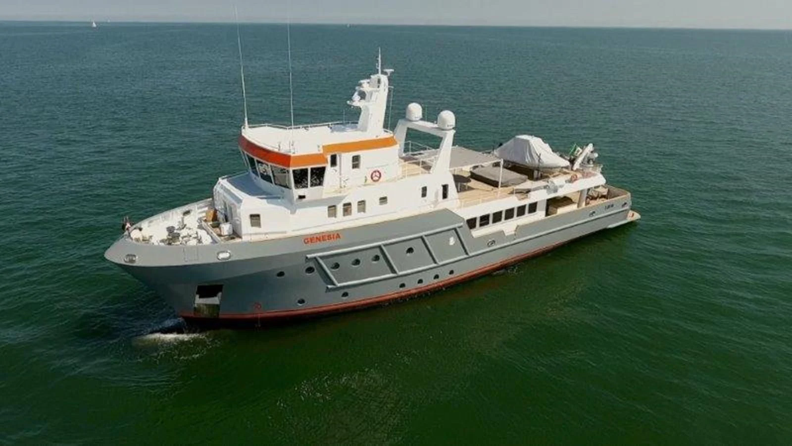 a boat in the water aboard OCEAN KING 130 Yacht for Sale