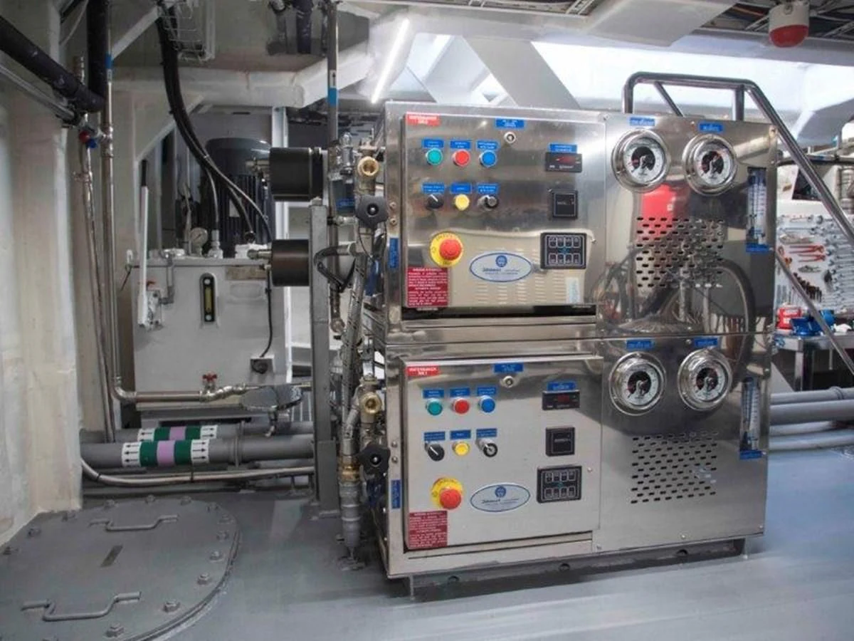a machine in a room aboard OCEAN KING 130 Yacht for Sale