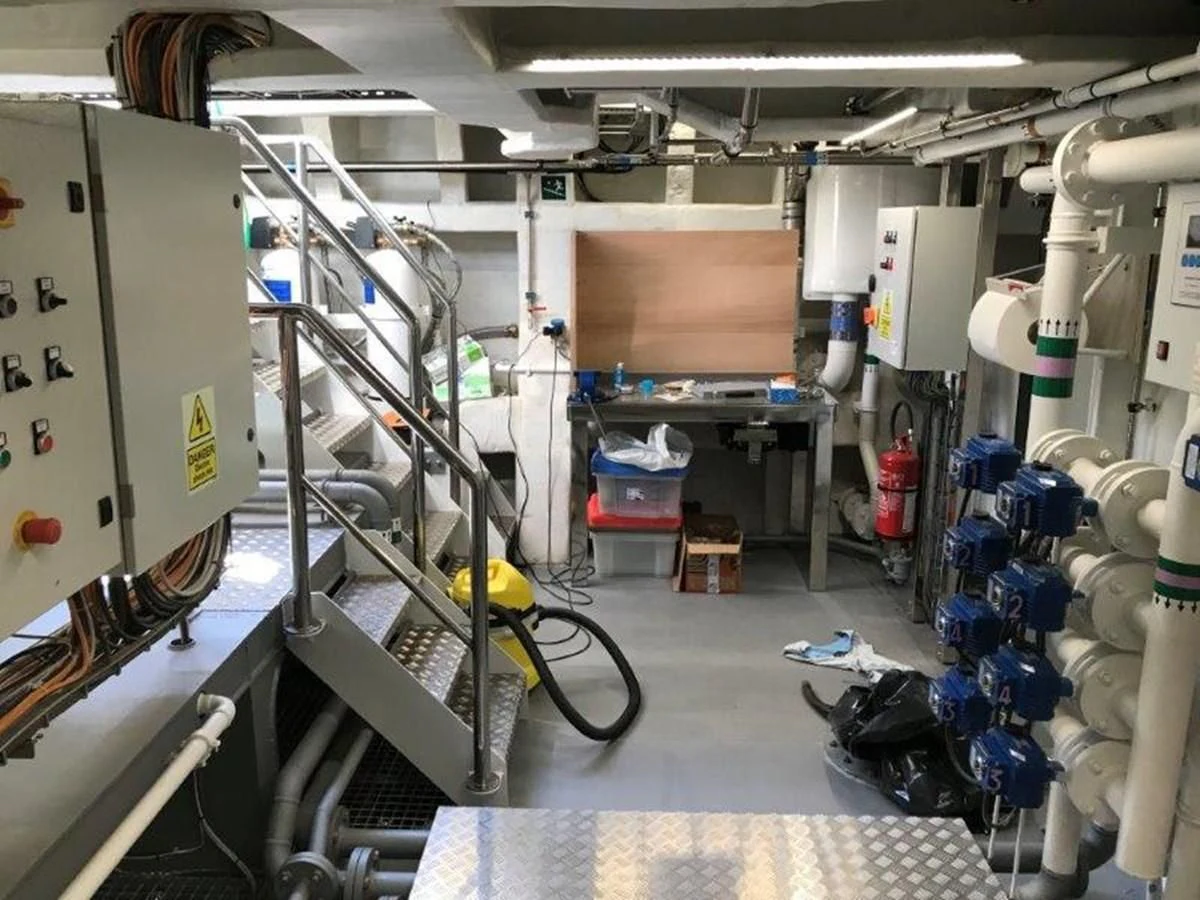 a room with machines and equipment aboard OCEAN KING 130 Yacht for Sale