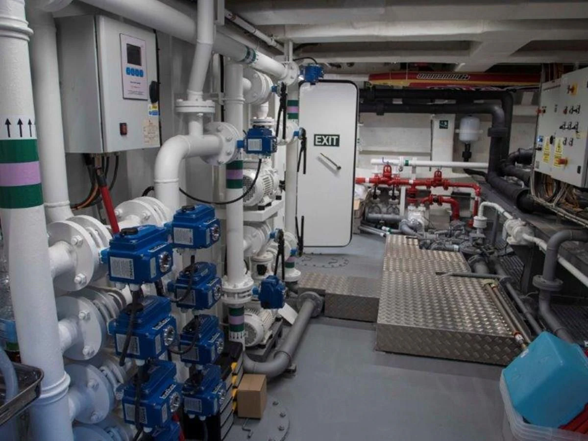 a room with machinery aboard OCEAN KING 130 Yacht for Sale