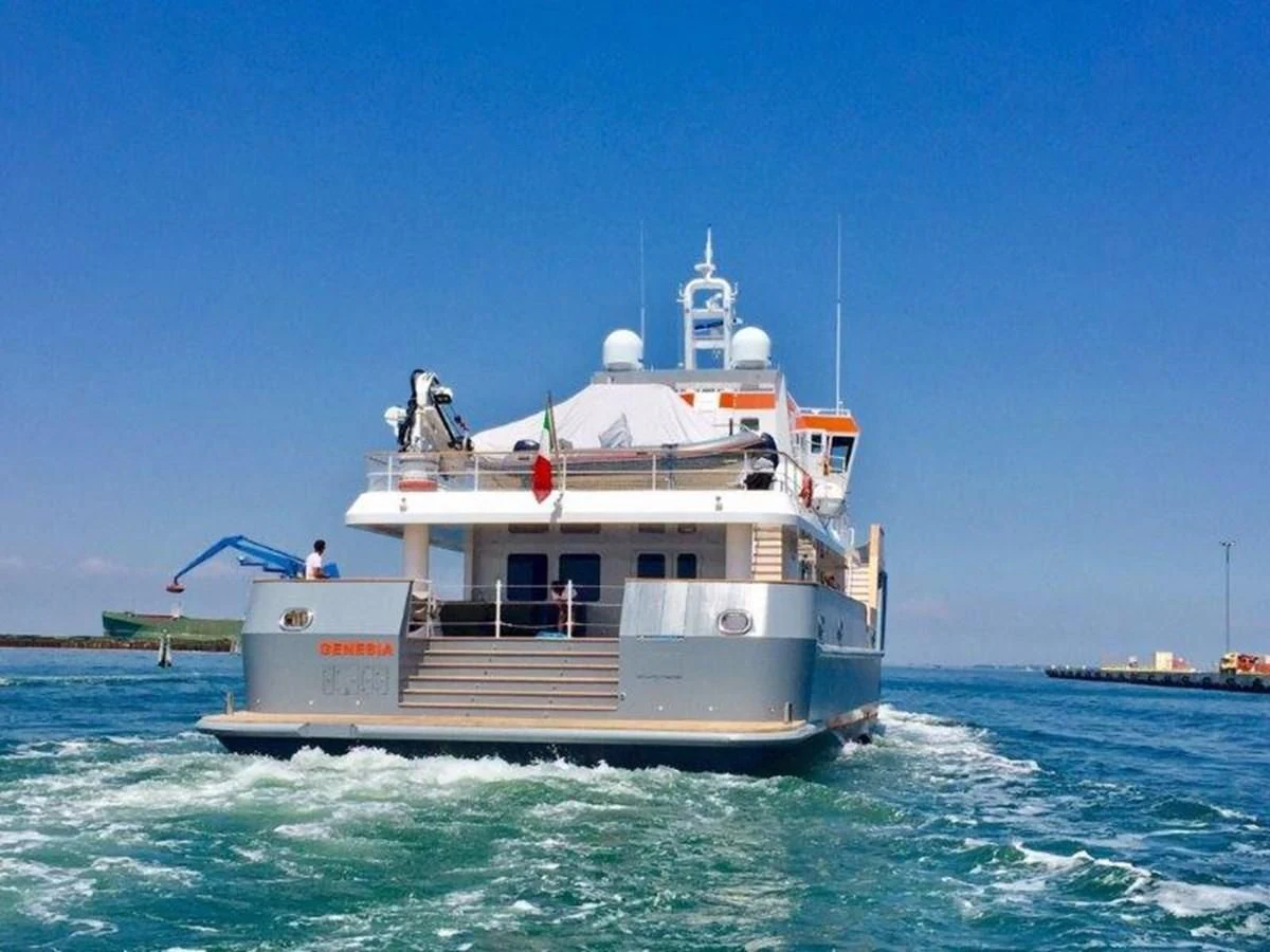 a boat in the water aboard OCEAN KING 130 Yacht for Sale
