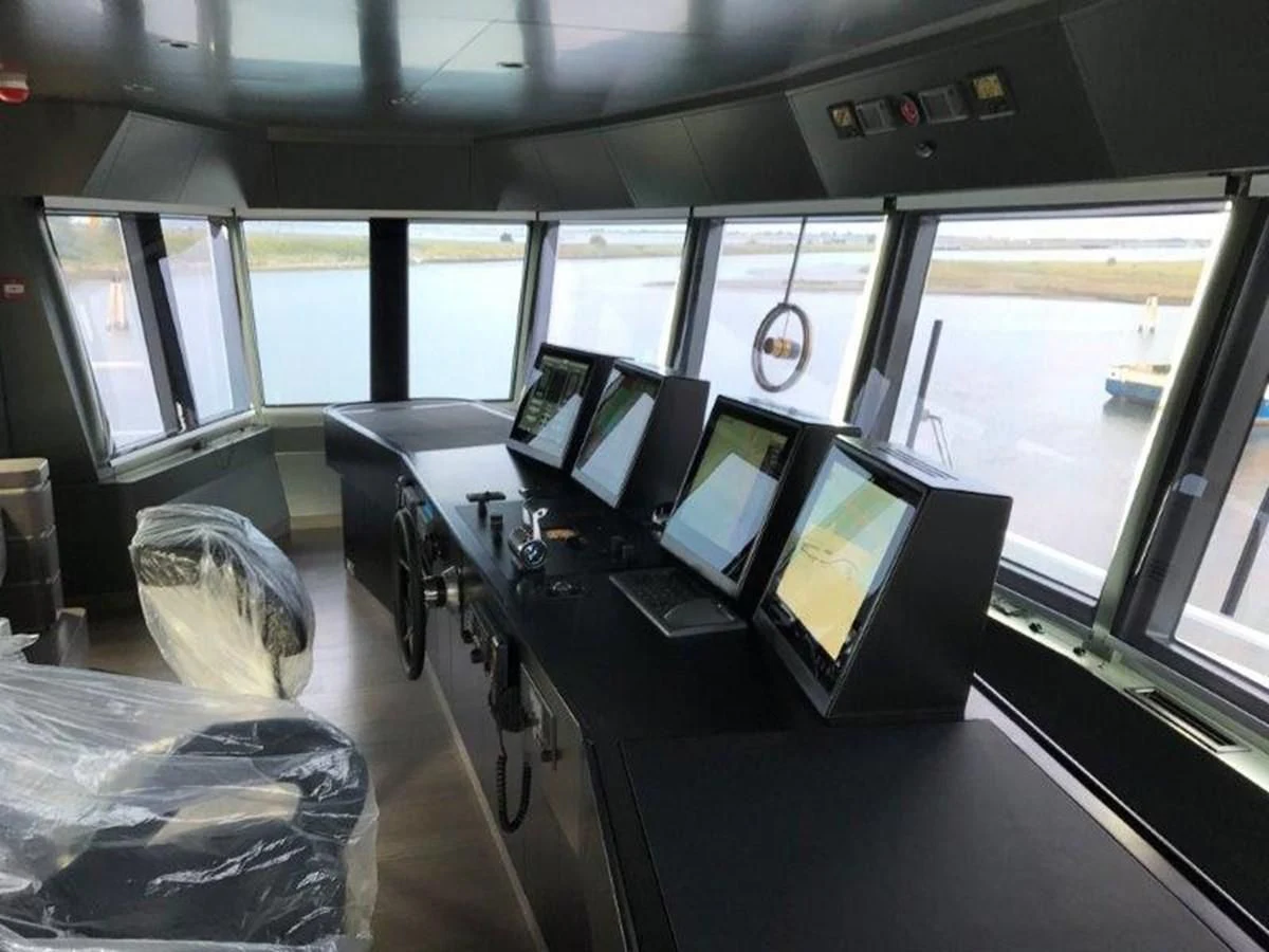a room with many computers aboard OCEAN KING 130 Yacht for Sale