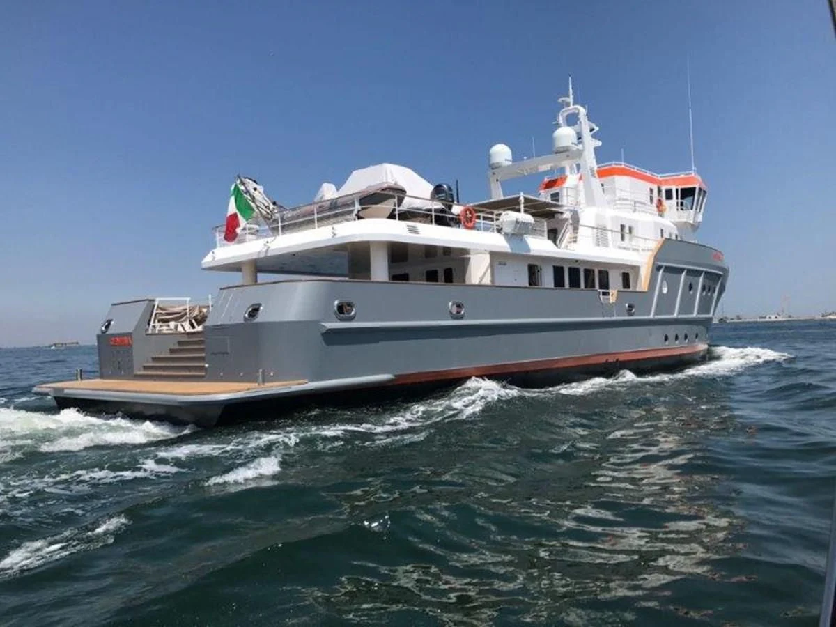a boat on the water aboard OCEAN KING 130 Yacht for Sale