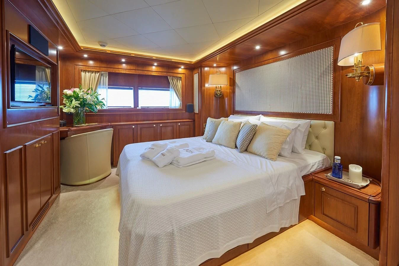 a bed in a room aboard IMAGINE Yacht for Charter