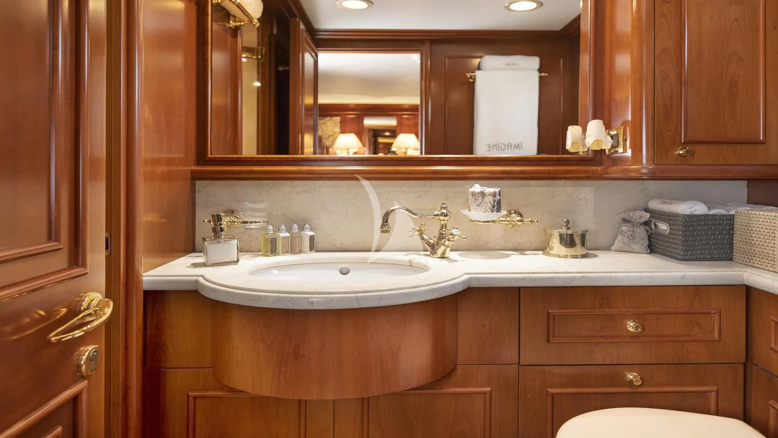a bathroom with a large mirror aboard IMAGINE Yacht for Charter