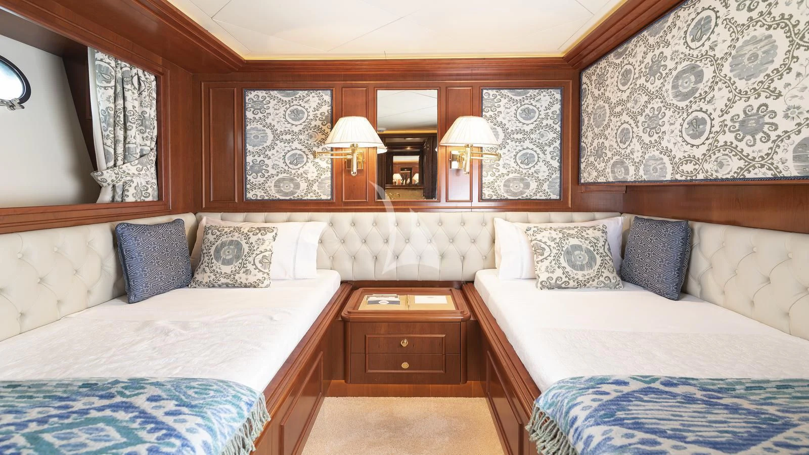 a room with two beds aboard IMAGINE Yacht for Charter