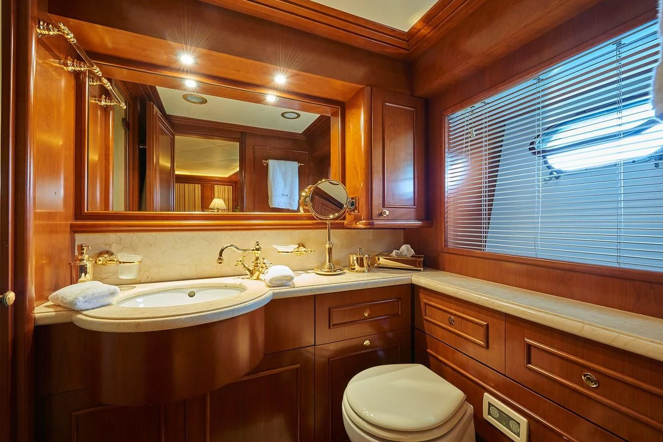 a bathroom with a large mirror aboard IMAGINE Yacht for Charter
