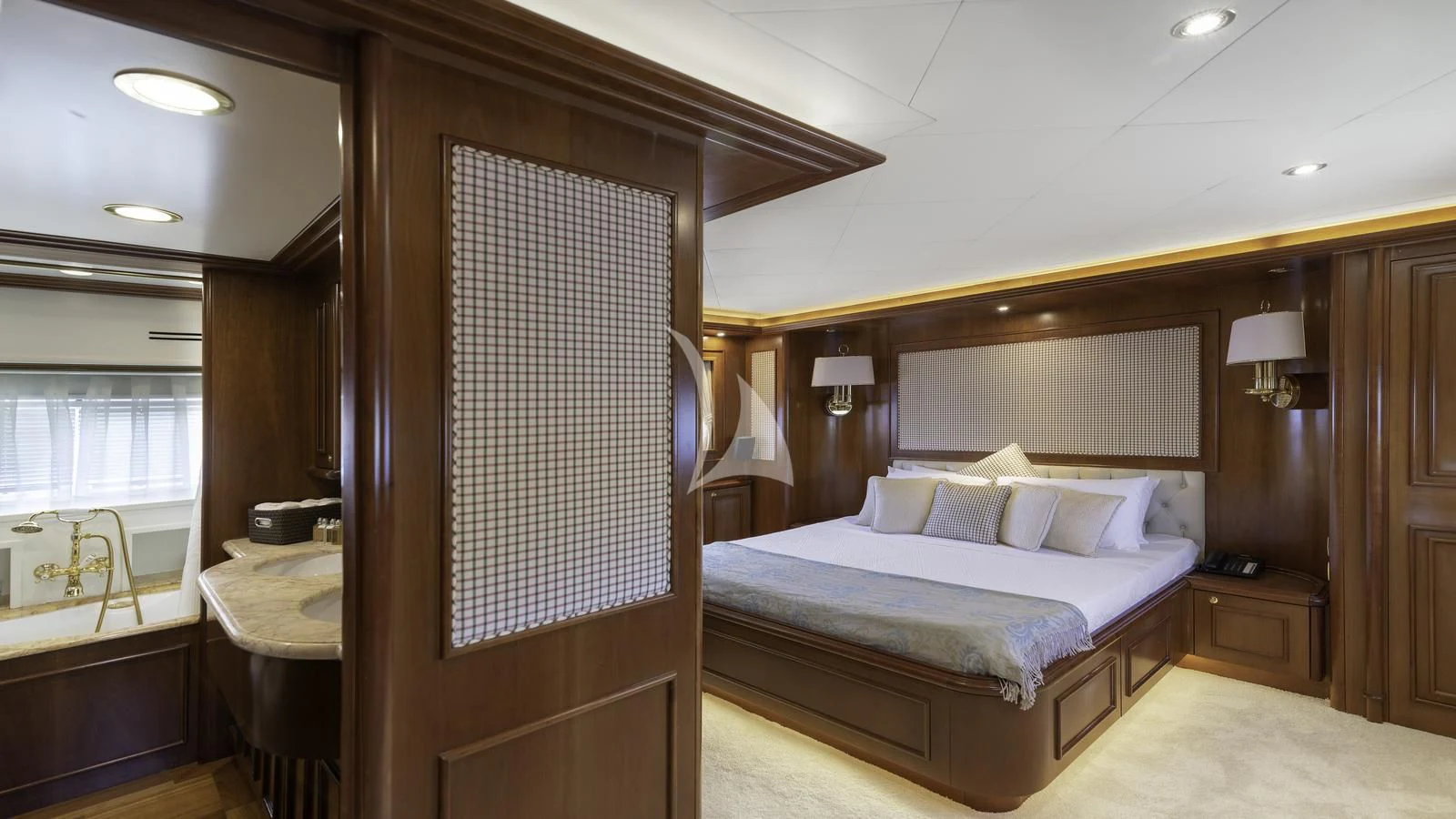 a bed in a hotel room aboard IMAGINE Yacht for Charter