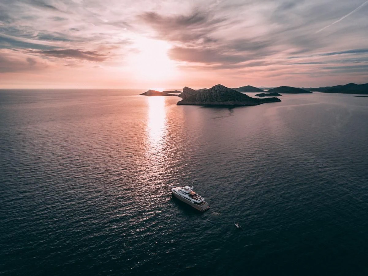 a boat on the water aboard IMAGINE Yacht for Charter