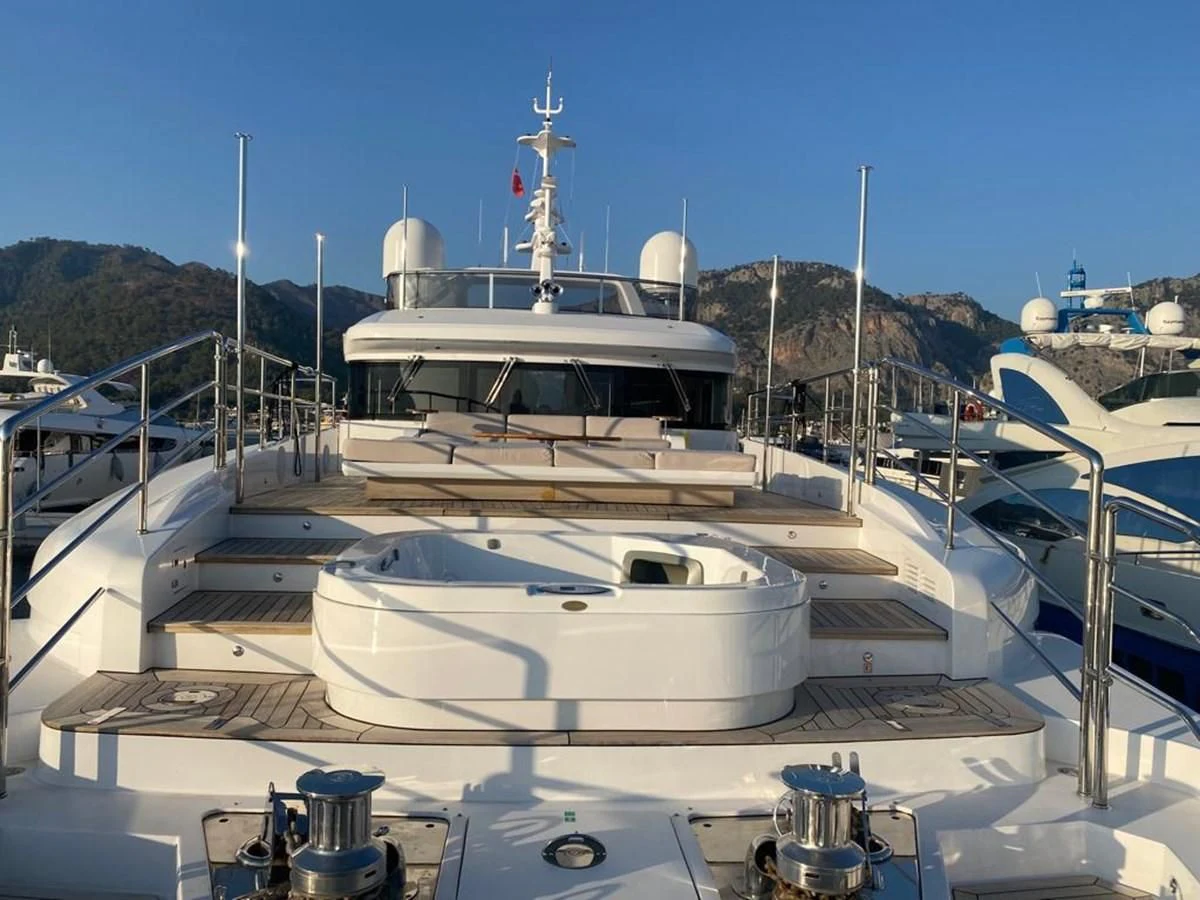 a large white boat aboard UNDICI Yacht for Sale