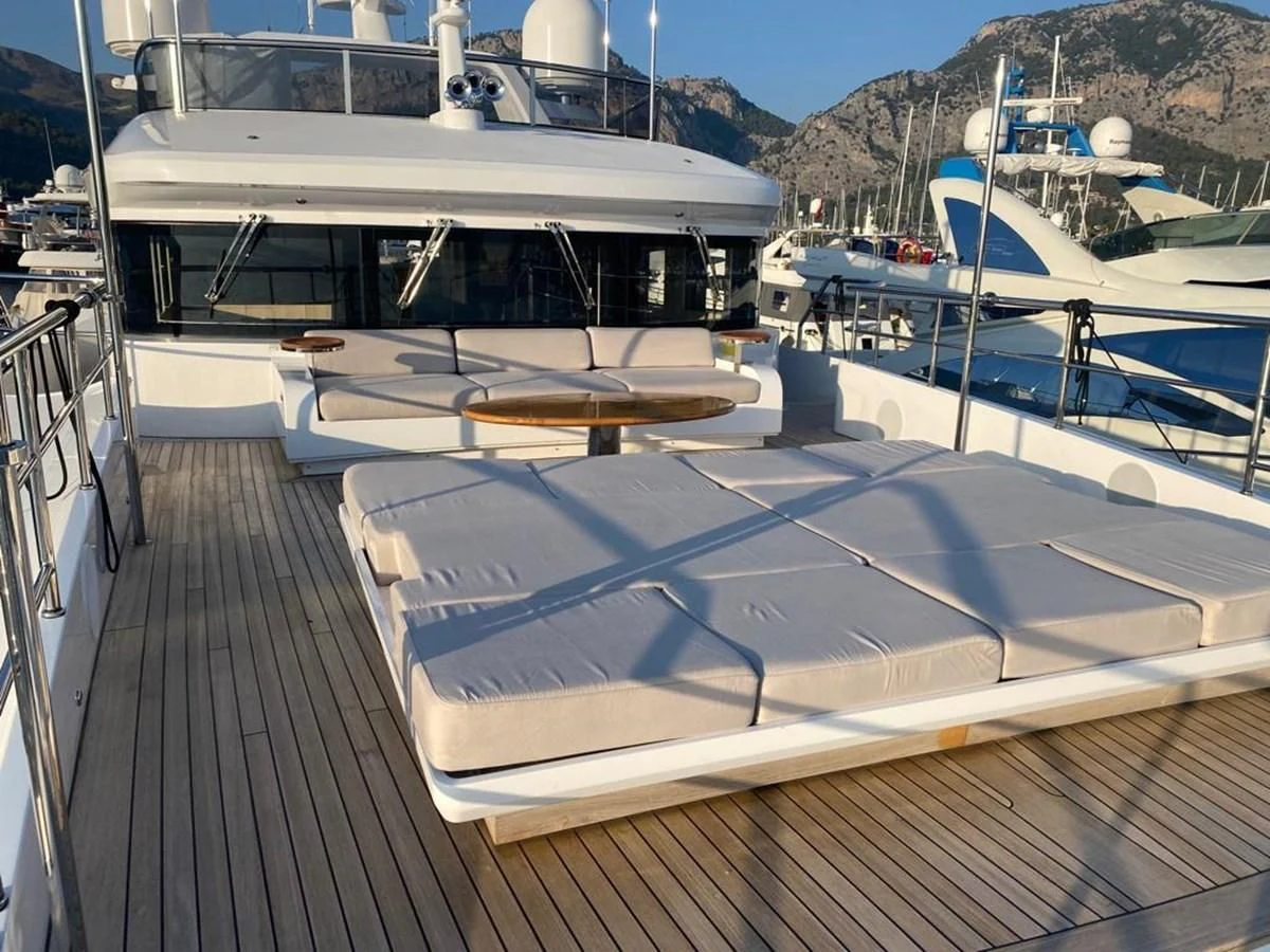 a deck with boats on it aboard UNDICI Yacht for Sale