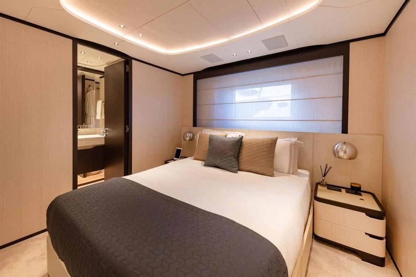 a bed in a room aboard UNDICI Yacht for Sale