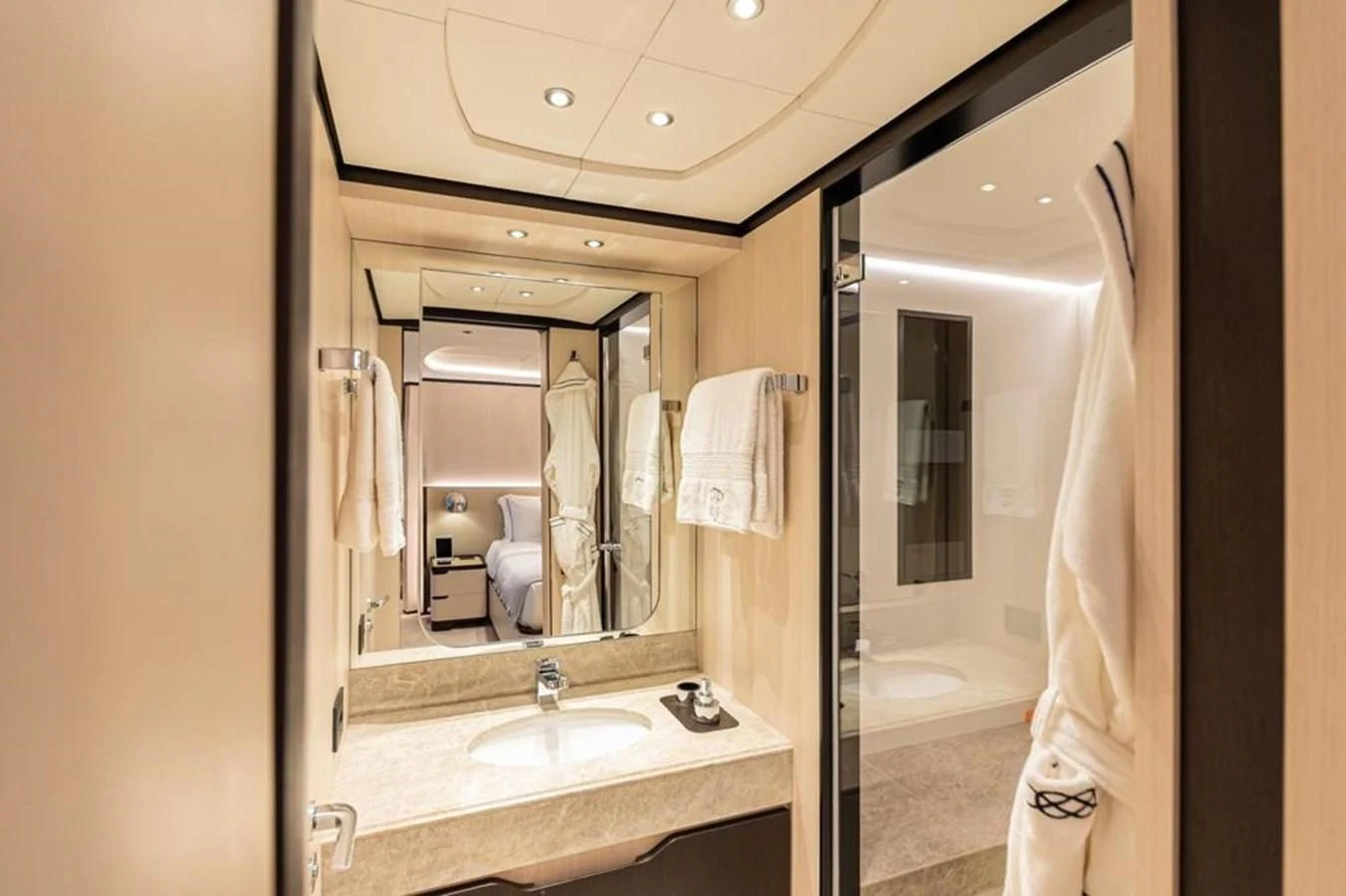a bathroom with a sink and a shower aboard UNDICI Yacht for Sale