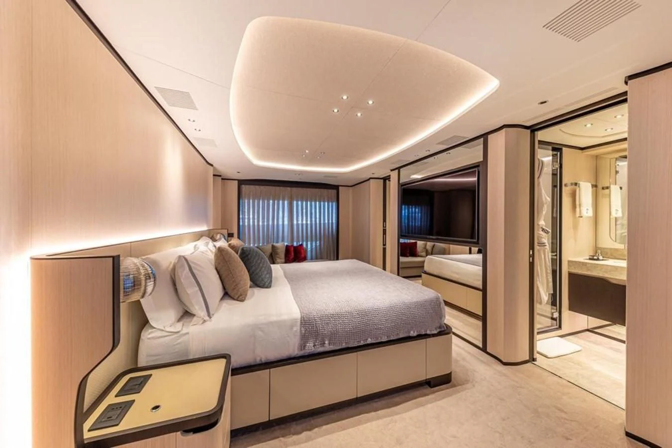 a bed in a room aboard UNDICI Yacht for Sale