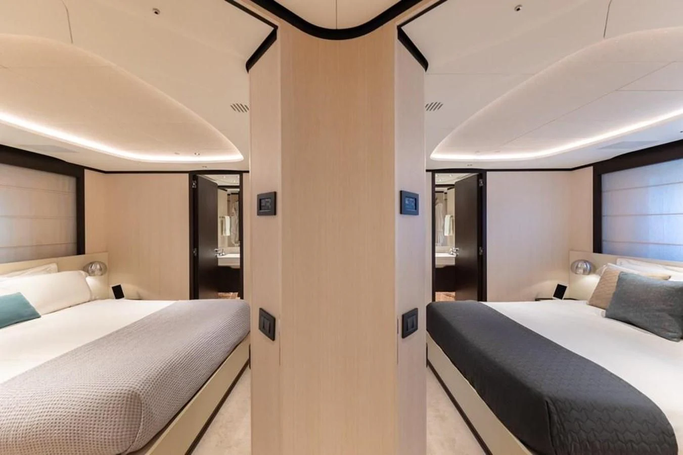 a room with two beds aboard UNDICI Yacht for Sale