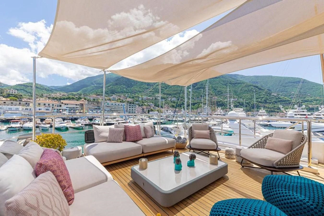 a large tent with a table and chairs in it aboard UNDICI Yacht for Sale