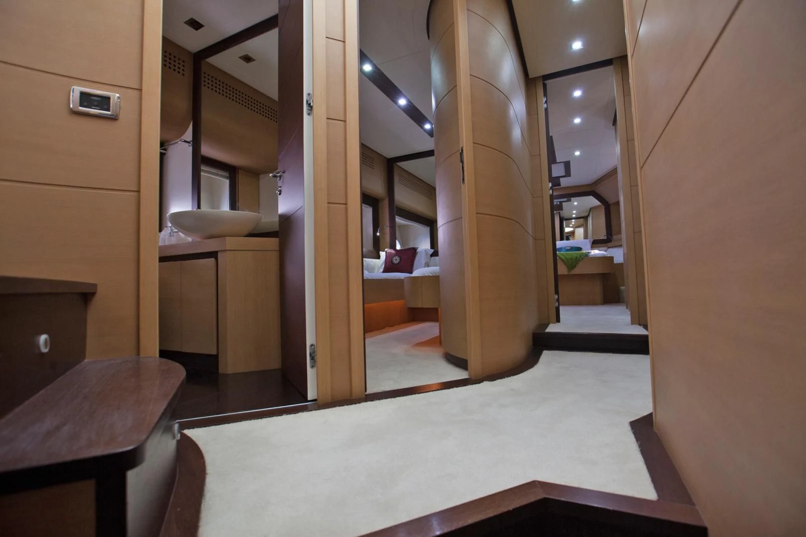 a bathroom with a large mirror aboard TOYZ4BOYZ Yacht for Sale