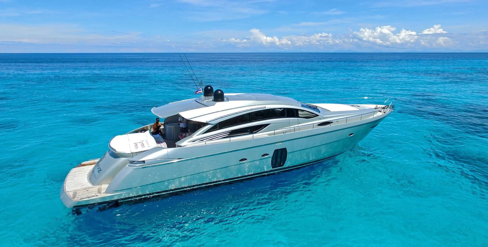 a white boat in the water aboard TOYZ4BOYZ Yacht for Sale