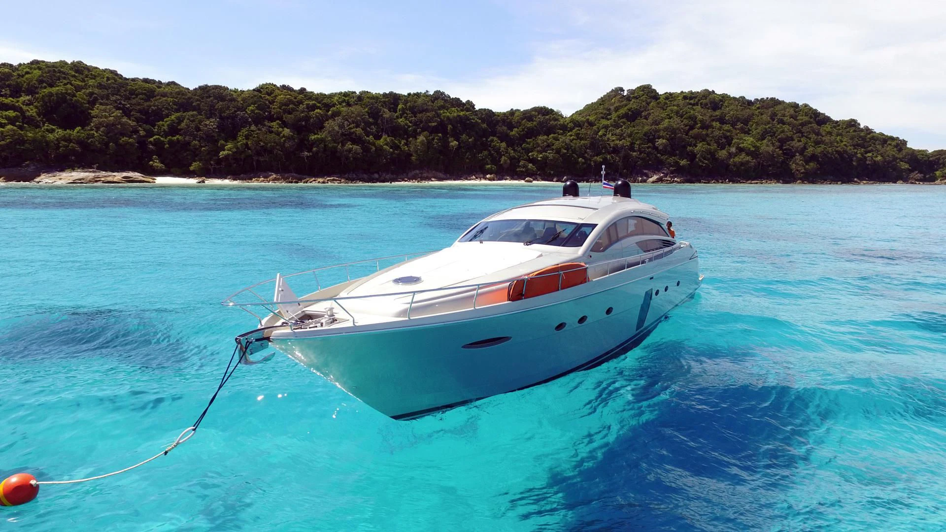 a white boat in the water aboard TOYZ4BOYZ Yacht for Sale