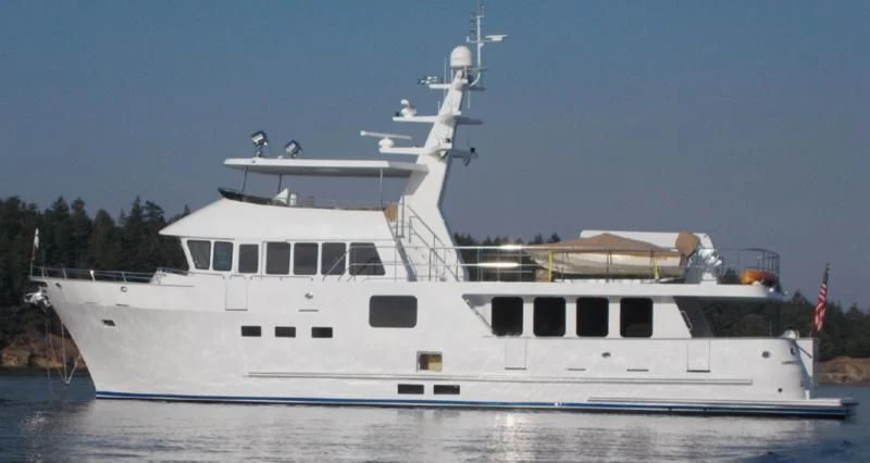 a large white boat aboard IIWII Yacht for Sale