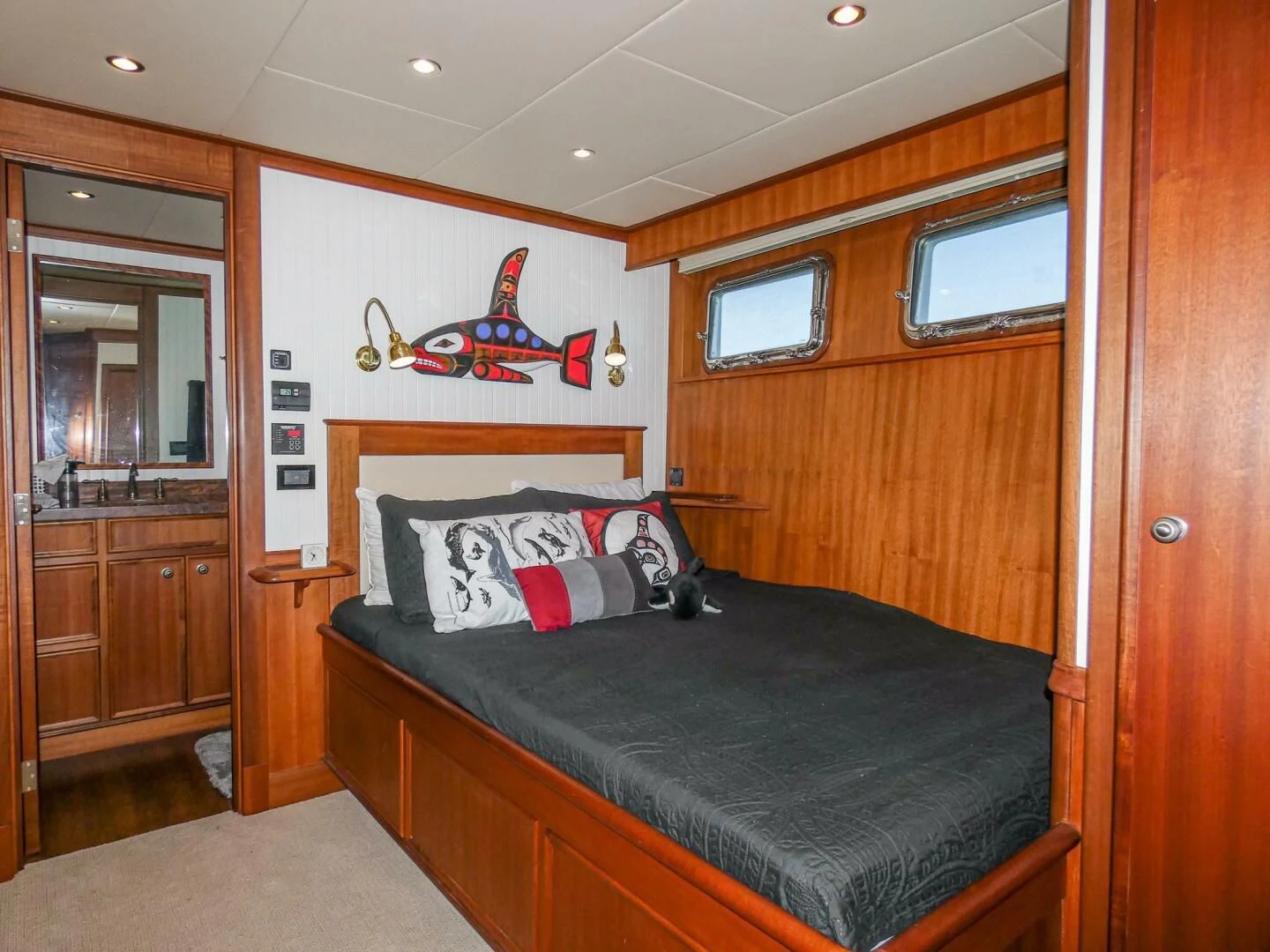a bed in a room aboard IIWII Yacht for Sale