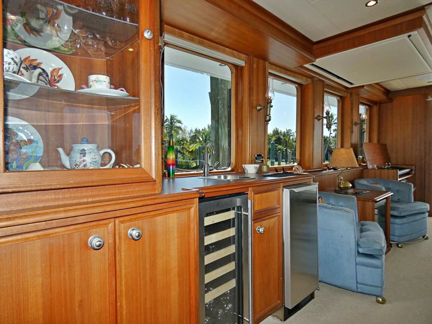 a kitchen with a sink and cabinets aboard IIWII Yacht for Sale