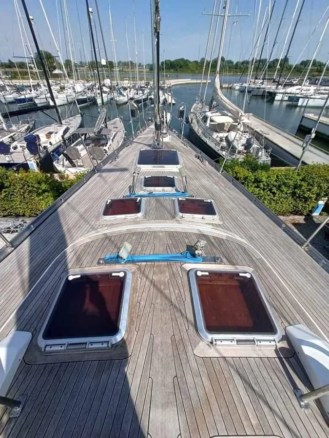 a deck with boats parked on it aboard PLUM Yacht for Sale