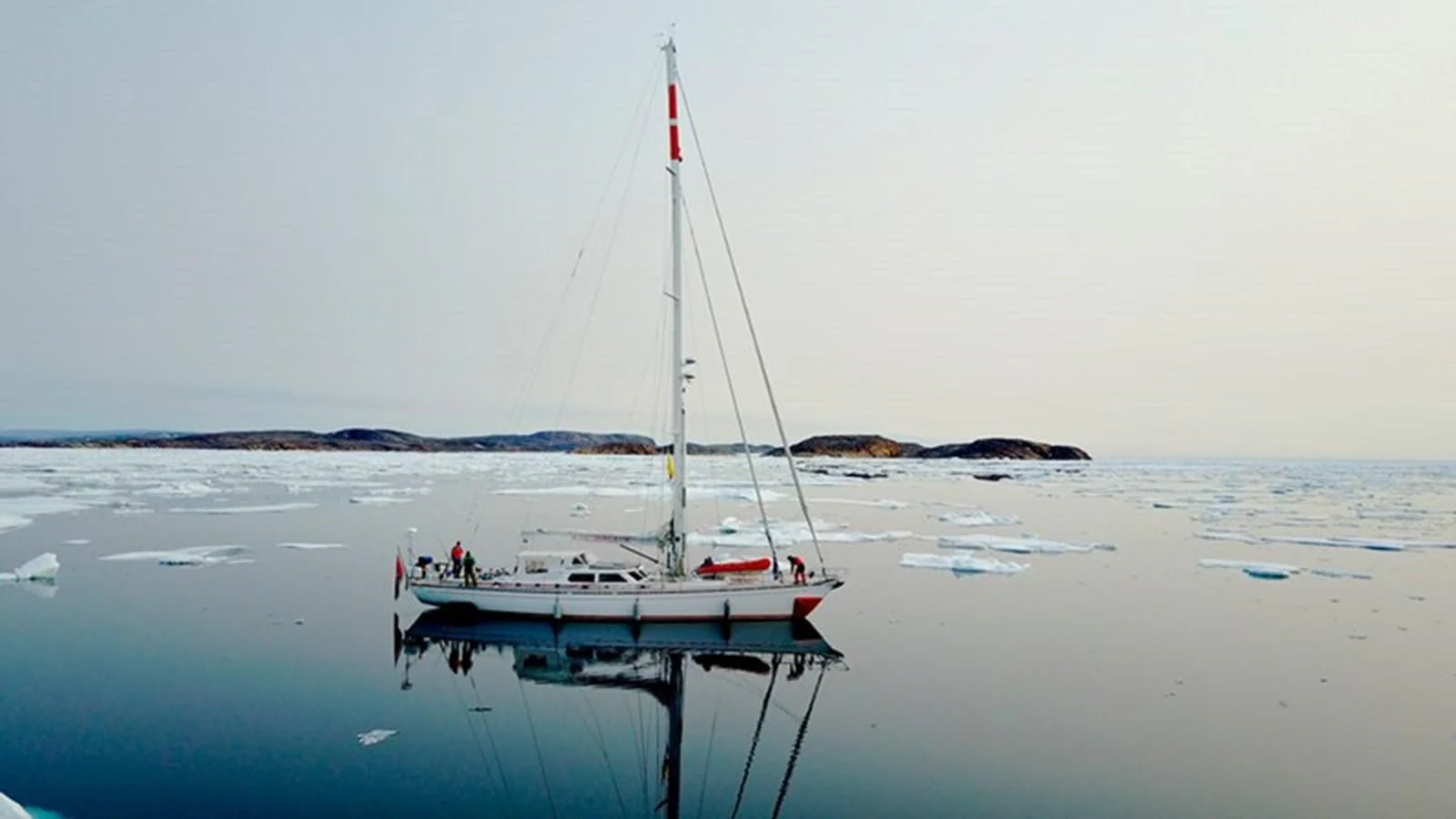 a sailboat on the beach aboard PLUM Yacht for Sale