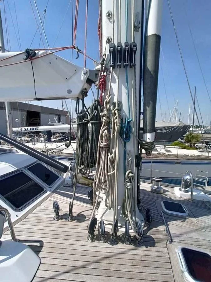 a boat is parked on a dock aboard PLUM Yacht for Sale