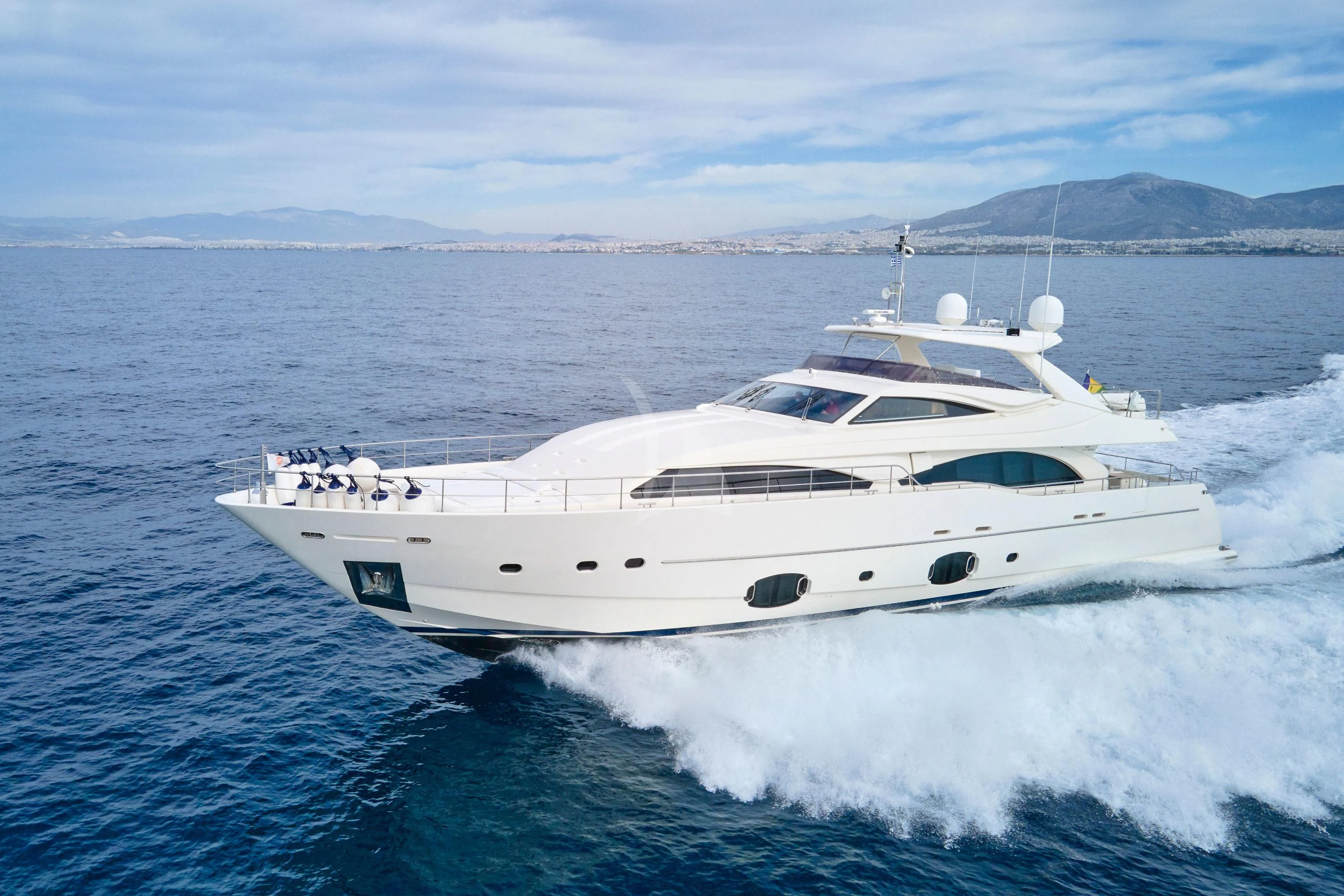 a white yacht on the water aboard PAREAKKI Yacht for Sale