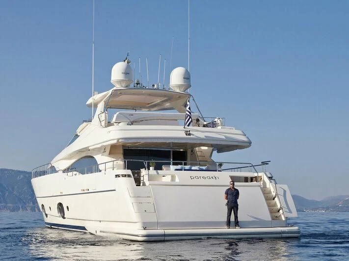a person standing on a boat aboard PAREAKKI Yacht for Sale