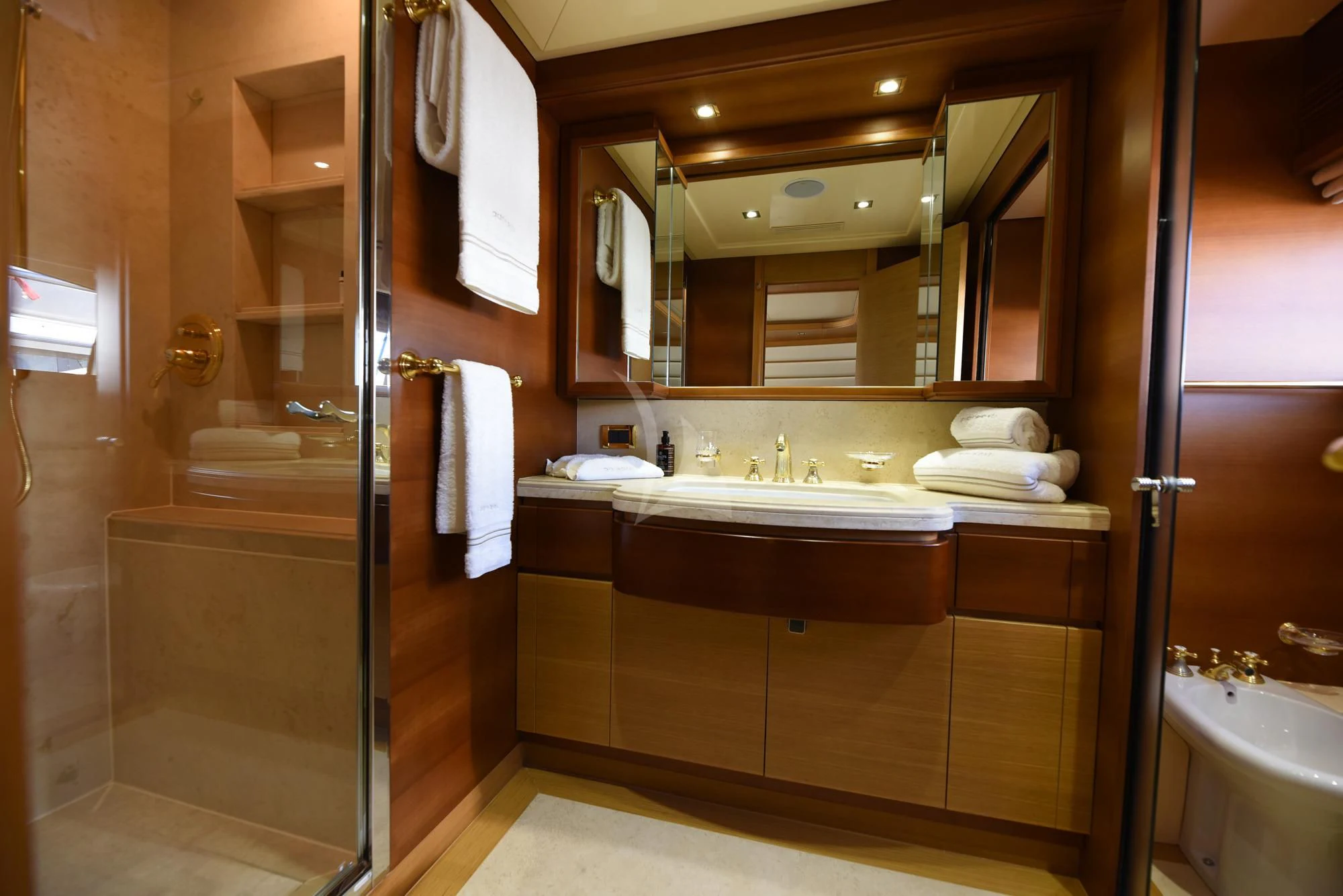 a bathroom with a sink and a mirror aboard PAREAKKI Yacht for Sale