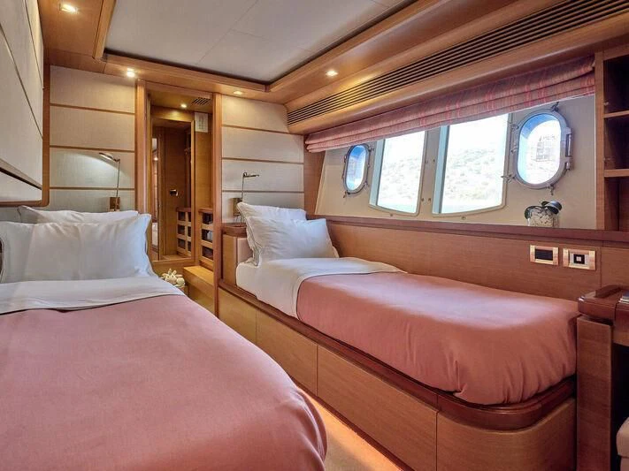 a couple of beds in a room aboard PAREAKKI Yacht for Sale